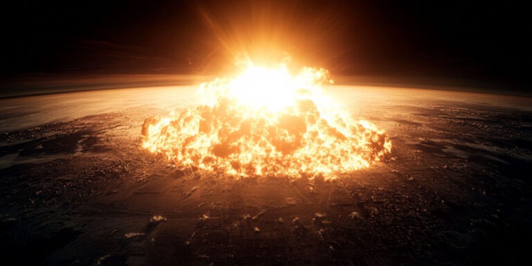 a massive fiery explosion resembling a nuclear blast spreading across a dark landscape with intense light and flames illuminating the surrounding area