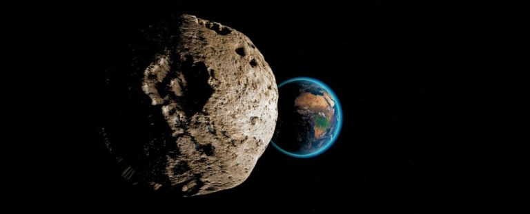 IllustrationOfAsteroidLoomingInFrontOfEarth
